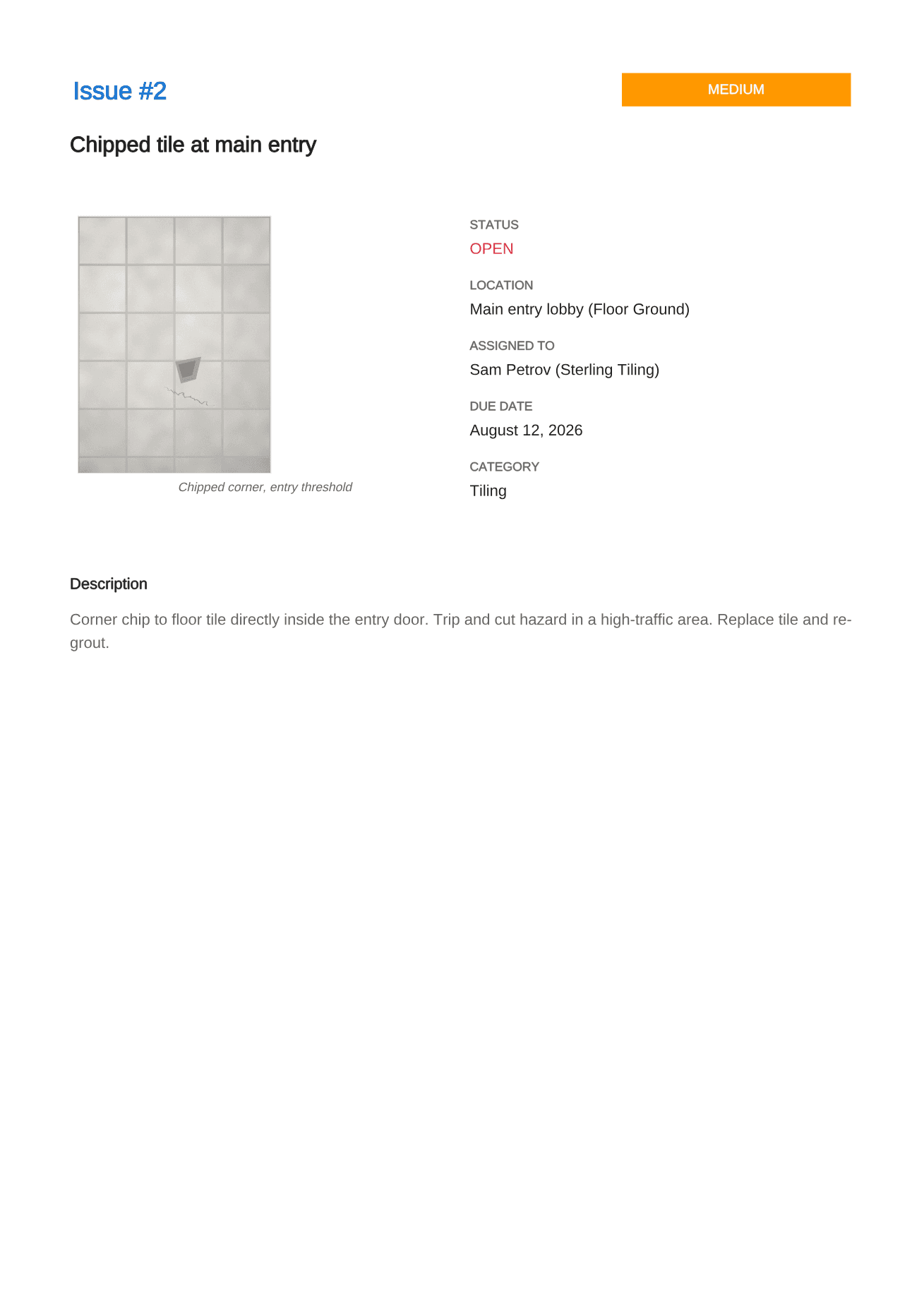The second defect page of the report, a chipped tile at the main entry, laid out identically to the first.